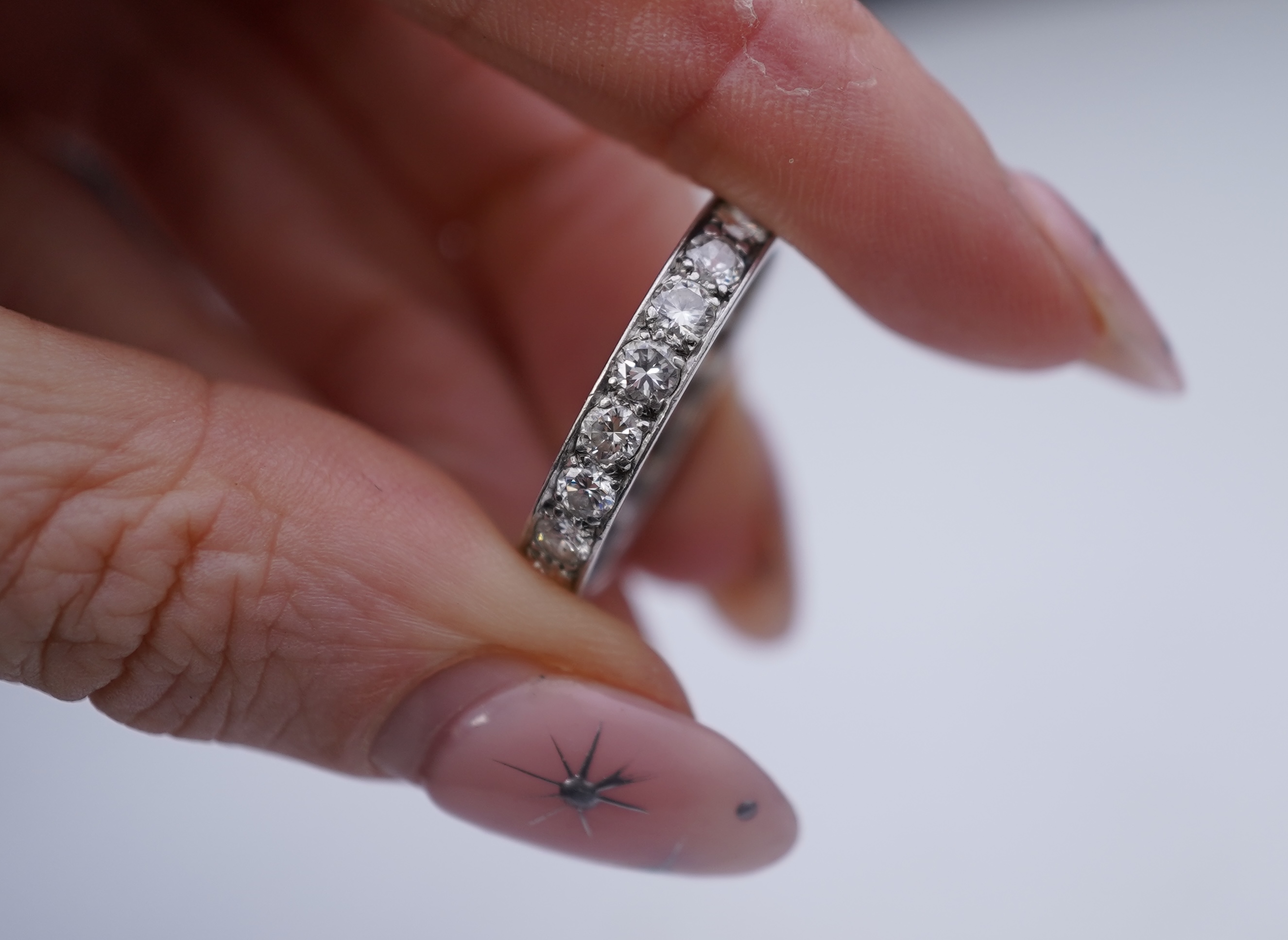 A diamond eternity ring, mid 20th century